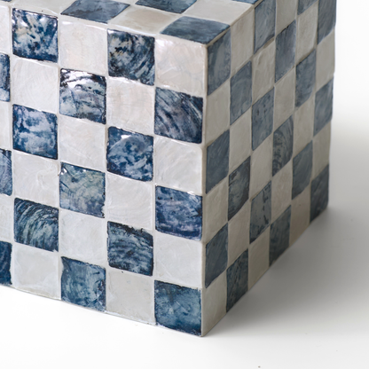 A close-up of the capiz shells tissue cover box featuring a glossy blue and white checkerboard pattern, shown on a plain white background.