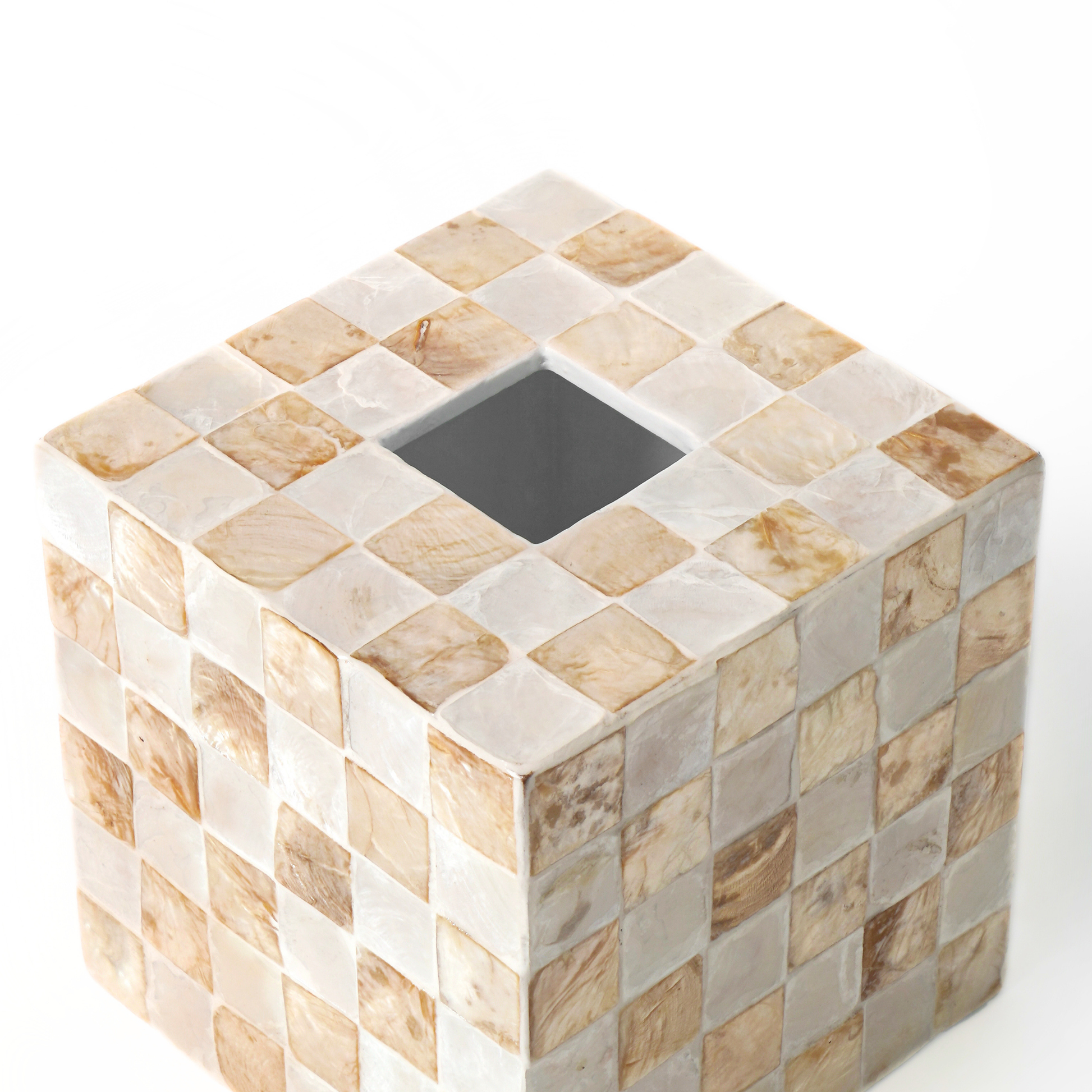 A square decorative tissue box holder with capiz shell tiles pattern in beige, cream, and ivory tones, featuring a square opening on top, set against a plain white background.